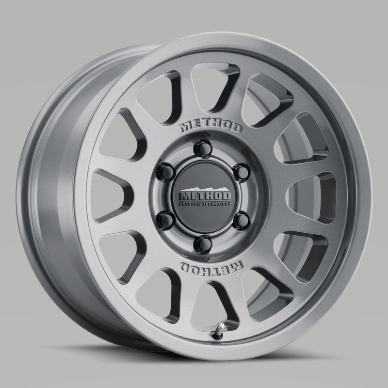 Method MR703 15×7 +15mm Offset 5×100 56.1mm CB Gloss Titanium Wheel | MR70357051815